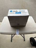 Box of Reli SuperValue trash bags on a table, showing front labeling with size and quantity.