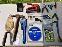 Full view of lot on table showing all hand tools and accessories