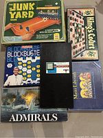 Top view showing all six original boxed vintage board games.
