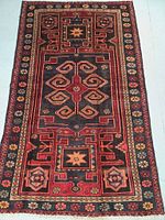 Full front view of entire rug showing overall design and condition