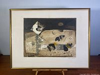 Full view of the framed etching showing the artwork and frame.