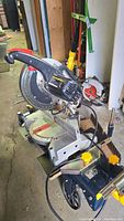 Craftsman miter chop saw angled front view on folding steel stand