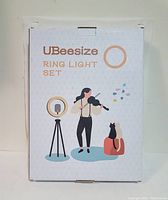 Packaged UBeesize ring light set showing front of box with branding and a graphic of usage