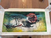 Full view of the lithograph artwork showing moonlit sky over water with boats, signed and numbered 11/25.