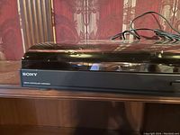 Closed view of Sony PS-LX150H turntable showing front Sony logo and dust cover closed.