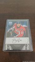 Front of the Brooks Laich autographed hockey card showing player image and signature.