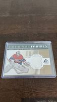 Front of Carey Price Authentic Fabrics jersey card showing the player image and embedded jersey swatch.