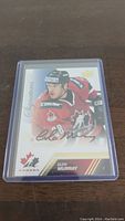 Front of Glen Murray hockey card showing player image, Team Canada logo, and autograph.