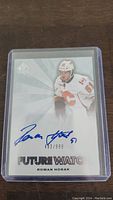 Front of Roman Horak hockey card showing player image, autograph, and serial number 493/999.