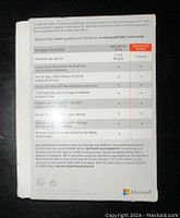 Back side of the Microsoft 365 Personal subscription box showing feature comparison and usage details.