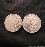 Obverse of two coins side by side showing Liberty heads and dates