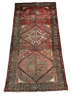 Full view of the Persian Zanjan rug, showing geometric design and color palette.