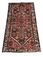Full view of the Persian Zanjan rug showing the overall design and color scheme in beige, brown and reddish hues with traditional motifs.