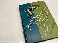 Photo of the book cover showing the title 'British Butterflies' by W. S. Coleman, new edition, with a butterfly illustration.