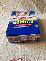 Closed 1990 Score NHL Hockey Premier Edition wax box showing front panel with title and year 1990