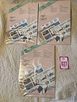 Three unopened sealed thematic Canada 1987 mint stamp sets in original packaging showing front view with CAPEX87 and thematic design visuals.