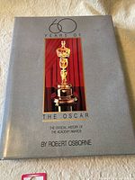 Front cover of the book showing the Oscar statuette image with title and author name.