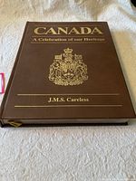 Photo of the front cover showing 'CANADA A Celebration of our Heritage' and author J.M.S. Careless with gold embossed Canadian Coat of Arms.