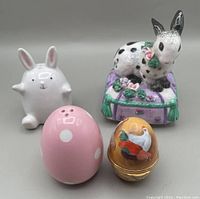 Overview of all four items showing the bunny music box, two egg and bunny salt shakers, and the Ashley House trinket box.