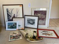 Lot overview showing six framed items and three unframed items, including various animal and landscape art prints.
