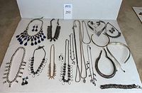 Overview of all jewelry pieces arranged on white background