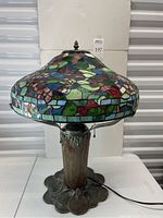 Full frontal view of lamp showing shade and base