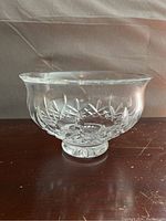 Side view of the Waterford crystal bowl showing cut crystal patterns and pedestal base.