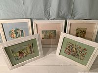 Five children's book illustrations by Maurice Sendak framed in white.