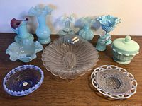 Full view of 11-piece lot with aqua and light blue glass items including vases, bowls, frosted platter, and covered dish