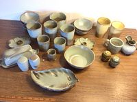 Overview photo showing full assortment of Frankoma pottery including tumblers, bowls, butter dish, S&P shakers, candlestick holders and more.