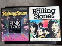 Photo of Rolling Stone magazine issue with Pink Floyd cover next to The Rolling Stones book titled The First Twenty Years.