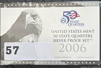 Box of 2006 United States Mint 50 State Quarters Silver Proof Set showing the label with North Dakota and South Dakota states.