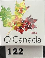 Front view of the packaging box with multicolored maple leaf design and 'O Canada 2014' text.