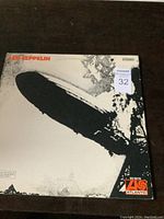 Front cover of the Led Zeppelin 1 1969 album with Hindenburg airship image.