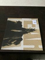 Front cover of the Pearl Jam Ten double vinyl album showing band members and large text.