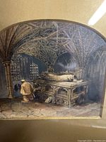 Framed gothic-style artwork showing vaulted stone arches, a kneeling person by a tomb, with inscription 'Tomb of Henry the II'