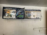 Wedge pillow, bed assist handle, and shoe rack boxed and stored on shelf