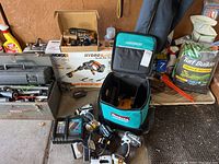 Overall overview of lot including Makita cordless tools, chargers, batteries, bag, hand tool boxes, Worx hedge trimmer