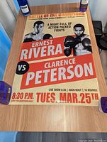 Boxing promo poster featuring Ernest Rivera vs Clarence Peterson for lightweight title fight at City Convention Hall, date March 25th, time 8:30 PM. Orange, cream, and black design with boxer portraits and event details.