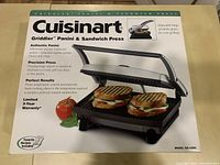Box of new Cuisinart Griddler Panini & Sandwich Press showing product image and brand name.