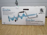 Photo of Swede-Bore Original Brace and Bit Ice Drill Auger in box showing product branding and features.