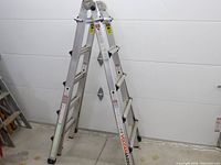 Ladder set up in A-frame position showing overall structure and condition
