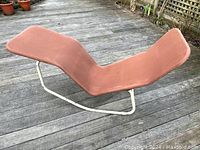 Front right side angle view of reclining chair on deck