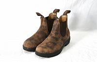 Front-angle photo of the pair of Blundstone brown leather boots displaying overall look and color.