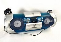 Front angle view of JVC RV-B550 boom box showing speakers, controls, and cassette deck.