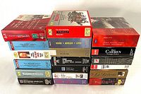 Photo showing stack of 19 boxed sets of romantic opera CDs from various composers and orchestras