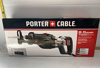 Front view of the Porter Cable Tiger Saw box showing the saw illustration and key specifications including 8.5 amp motor and orbital reciprocating action.