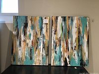 Pair of acrylic abstract paintings on canvas with vertical brush strokes and varied tones, displayed side by side.