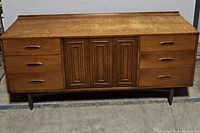 Full front view of mid-century dresser showing overall design and condition