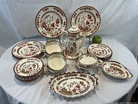 Full arrangement of all 31 pieces on table